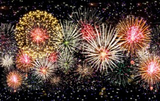 colorful fireworks against a black sky; 10 Tips to Prepare for Your New Year's Resolutions